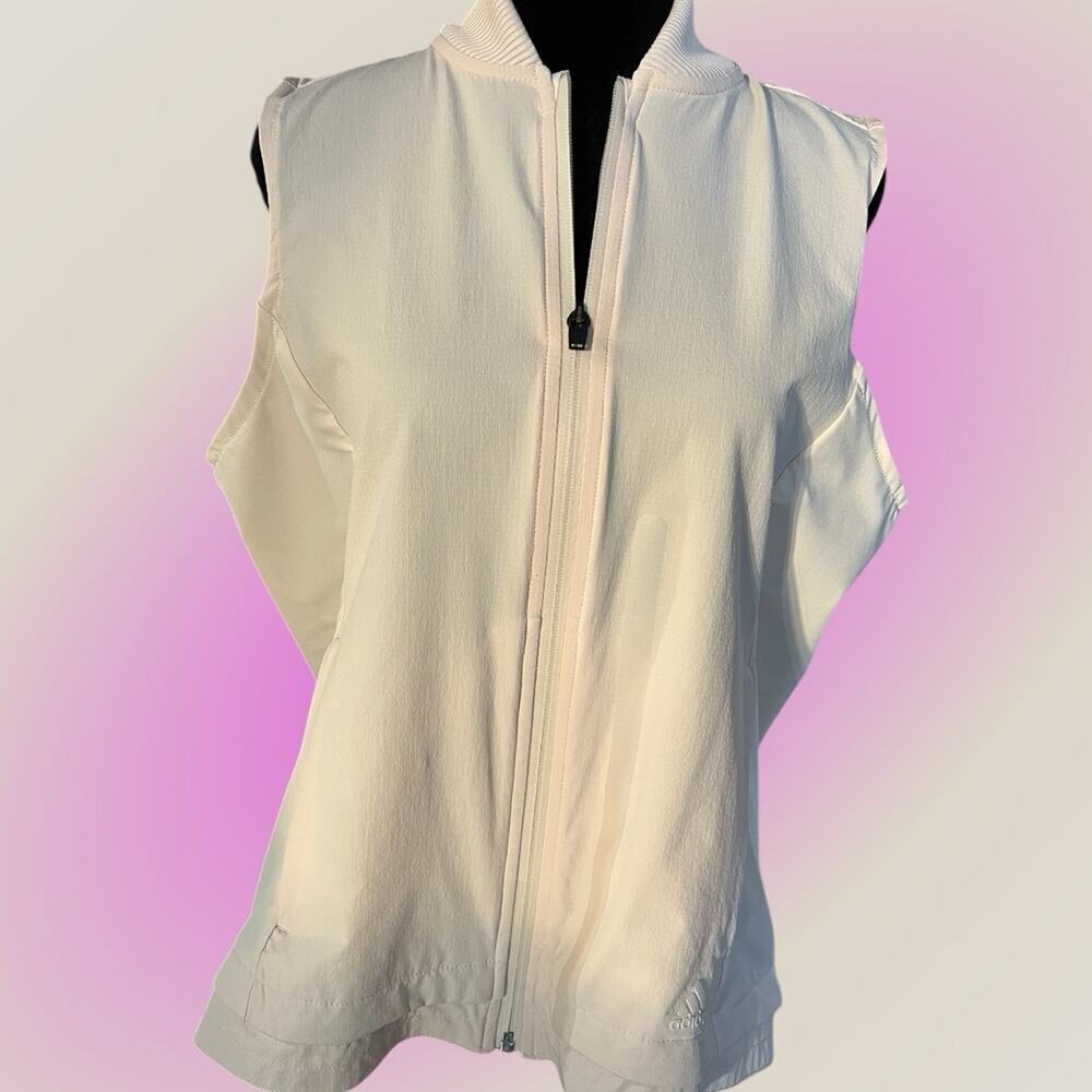 Adidas women’s running vest size M. Cream/ivory color. Full front zip.